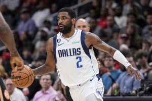 Kyrie Irving setting up a dribble move during a game against the Atlanta Hawks