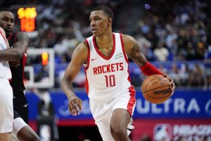 Jul 7, 2023; Las Vegas, NV, USA; Houston Rockets forward Jabari Smith Jr. (10) dribbles the ball against the Portland Trail Blazers during the second half at Thomas & Mack Center. Mandatory Credit: Lucas Peltier-USA TODAY Sports