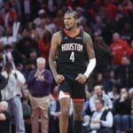 Jan 13, 2025; Houston, Texas, USA; Houston Rockets guard Jalen Green (4) reacts after a play during the second half against the Memphis Grizzlies at Toyota Center. Mandatory Credit: Troy Taormina-Imagn Images