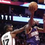 Feb 12, 2025; Houston, Texas, USA; Phoenix Suns forward Kevin Durant (35) drives against Houston Rockets forward Tari Eason (17) in the first quarter at Toyota Center. Mandatory Credit: Thomas Shea-Imagn Images